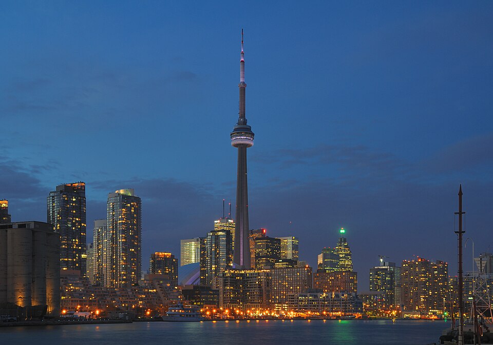 Toronto skyline at night with illuminated CN Tower