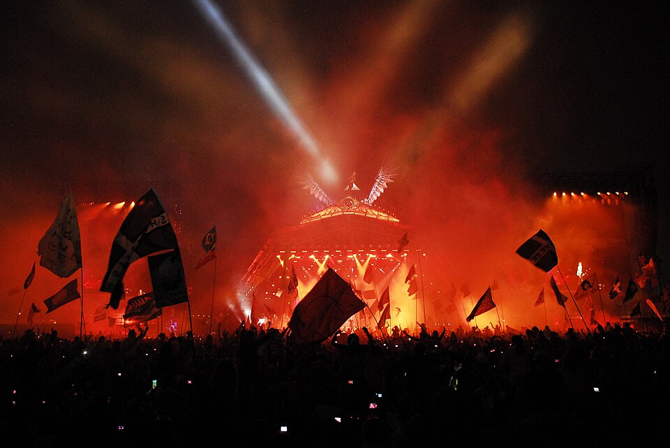 Live performance on the Phoenix Stage at Glastonbury Festival 2014 with a large crowd watching