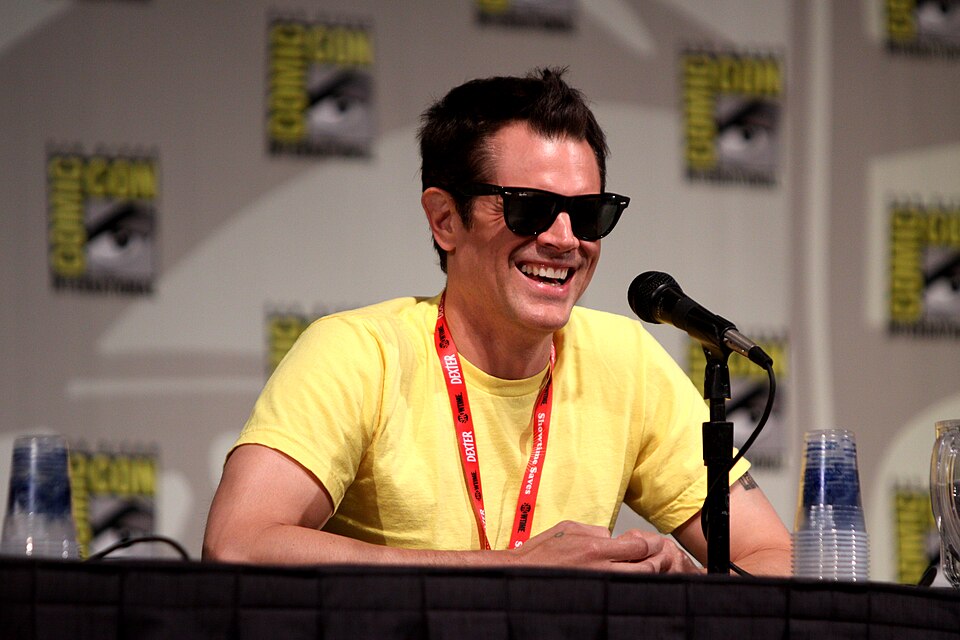 Johnny Knoxville at a public appearance, smiling for fans