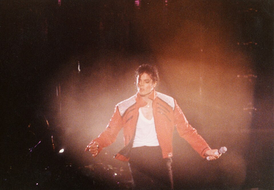 Michael Jackson dancing on stage during a live concert performance