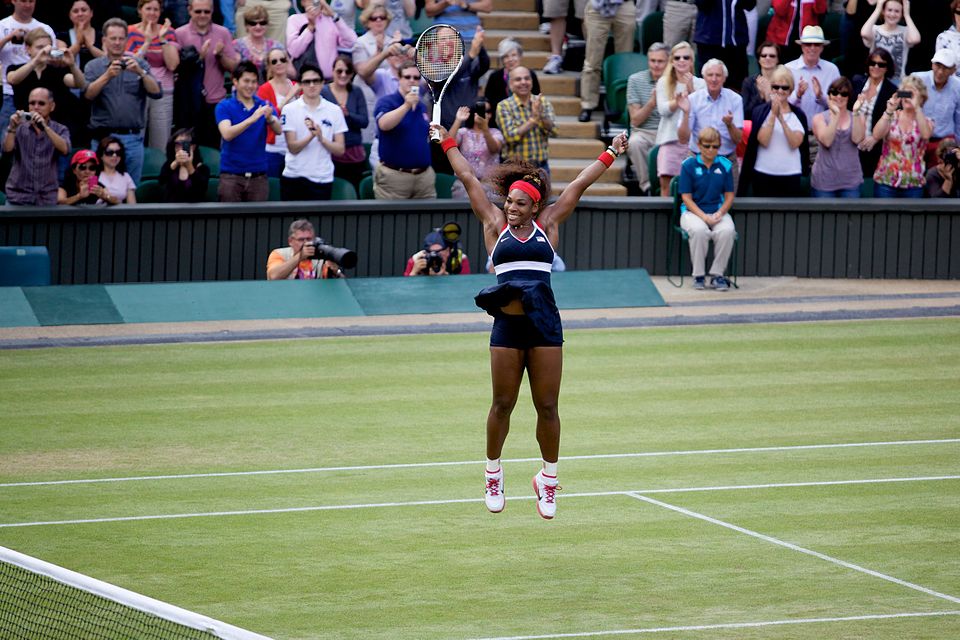 Serena Williams celebrating a victory on court