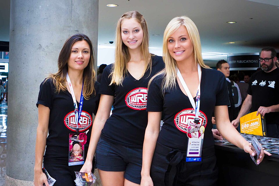 Gaming expo floor with crowds and large displays at E3