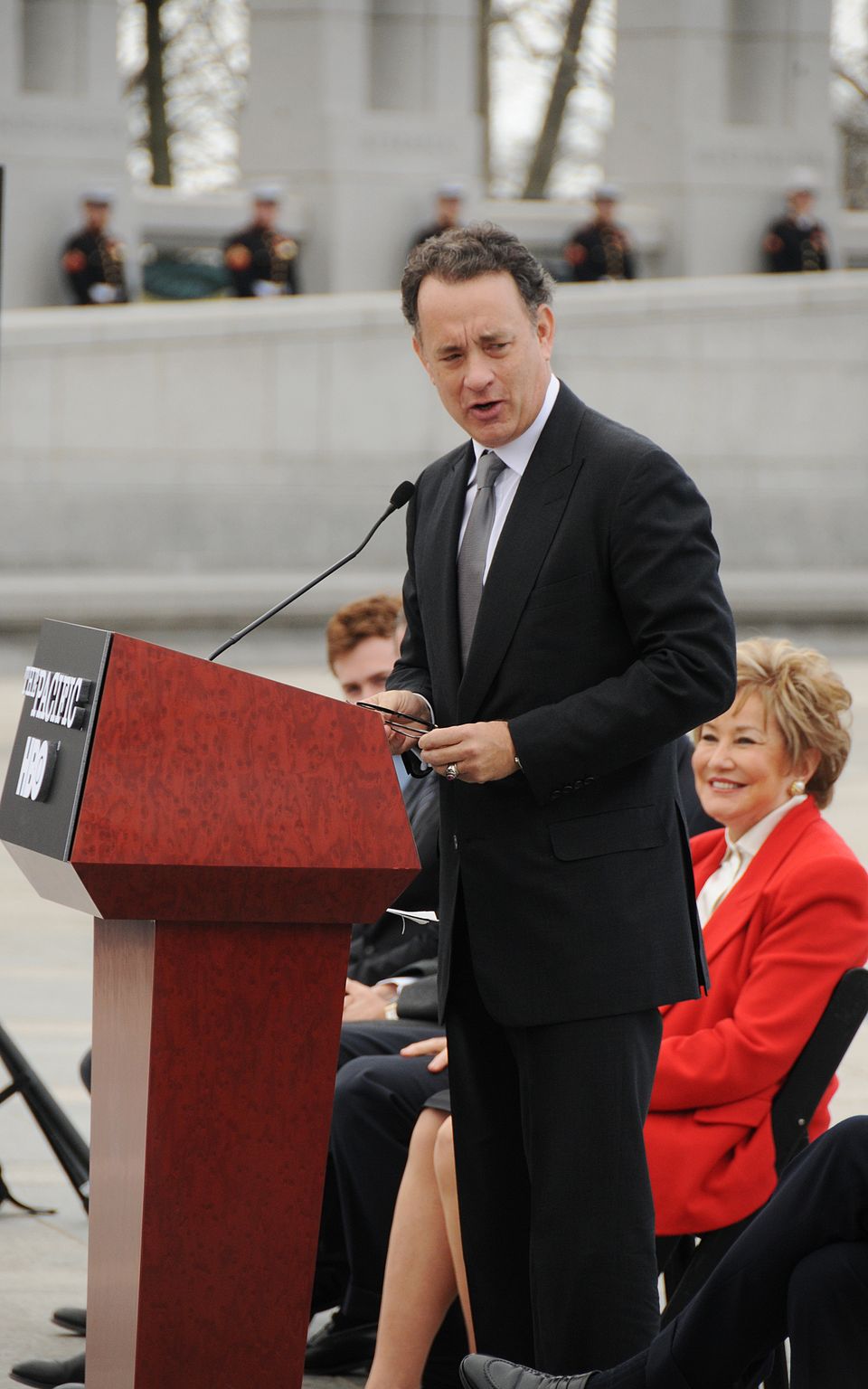 Tom Hanks speaking to veterans at the World War II Memorial in Washington DC