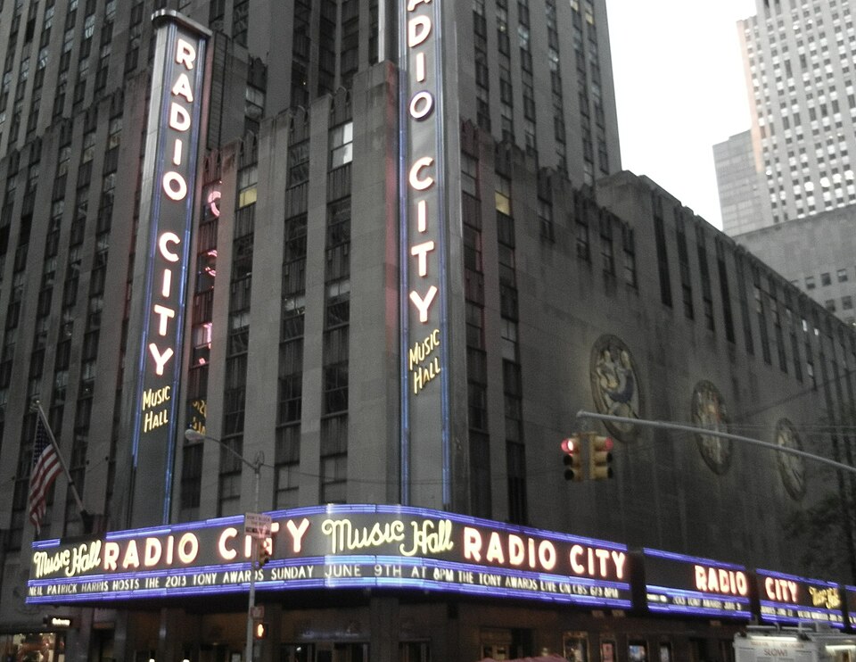 Tony Awards marquee sign lit up on Broadway theater district